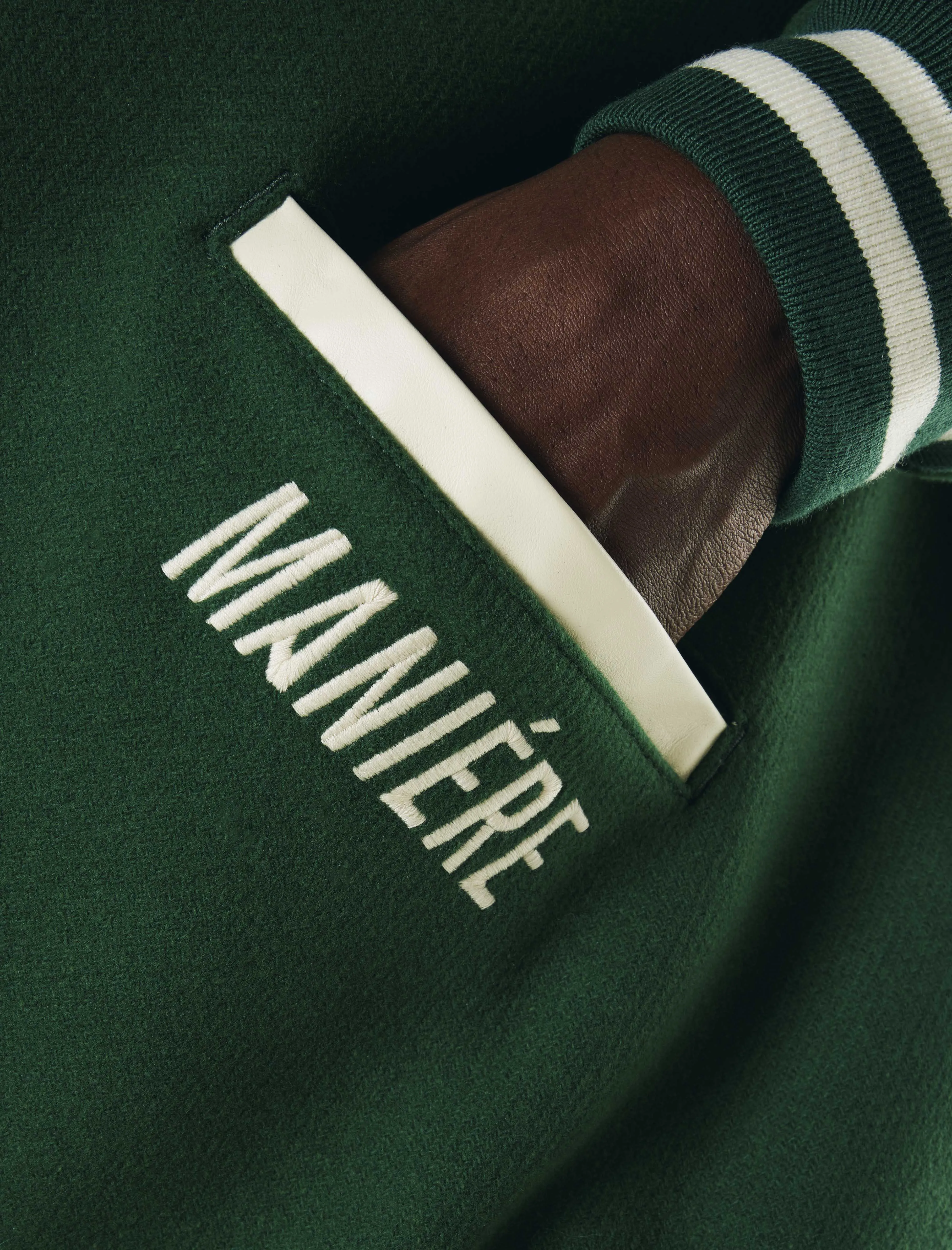 A MA MANIRE ANNIVERSARY VARSITY JACKET