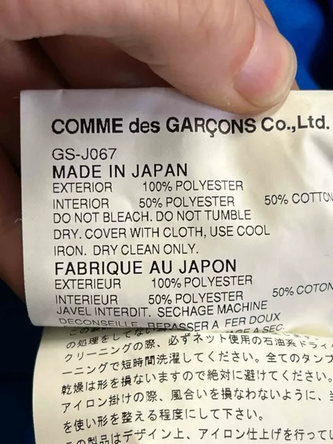 Size M |  Comme des Garons Asymmetrical Jacket